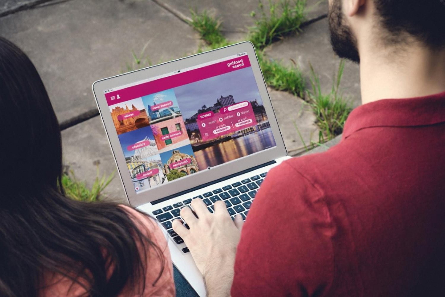 Couple booking a hotel online on a laptop, illustrating digital reservations in the U.S. hospitality market